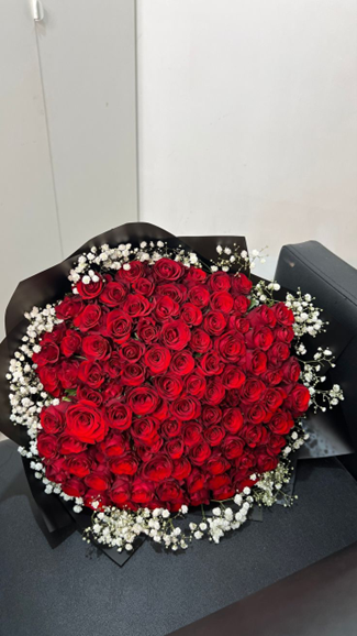Red Roses with Gyp by Petal Craft